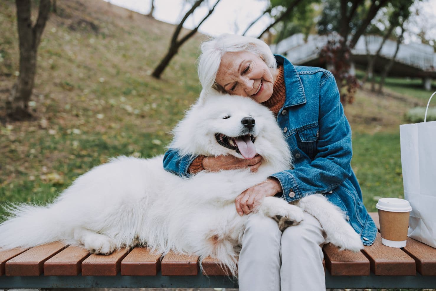 Woman with her white dog